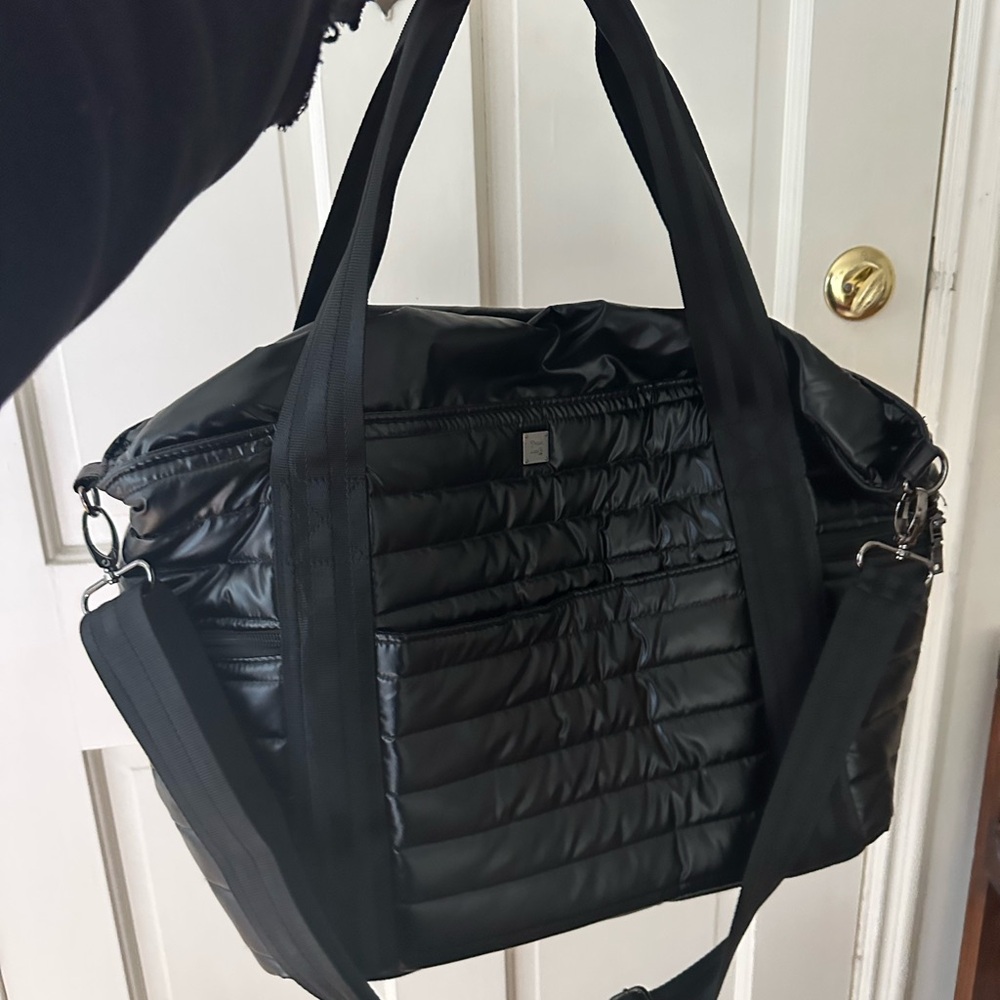 Think Royln Black Quilted travel tote with lots of pockets
